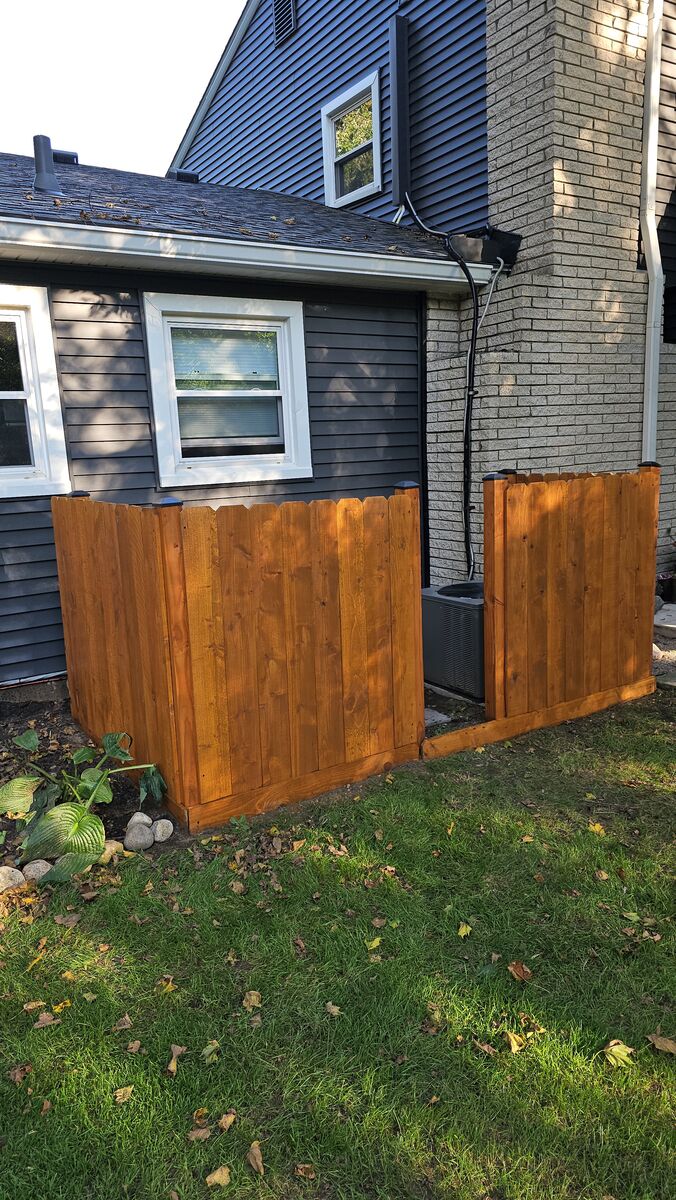 Overhead view of the same freshly stained cedar fence screen, Novi MI