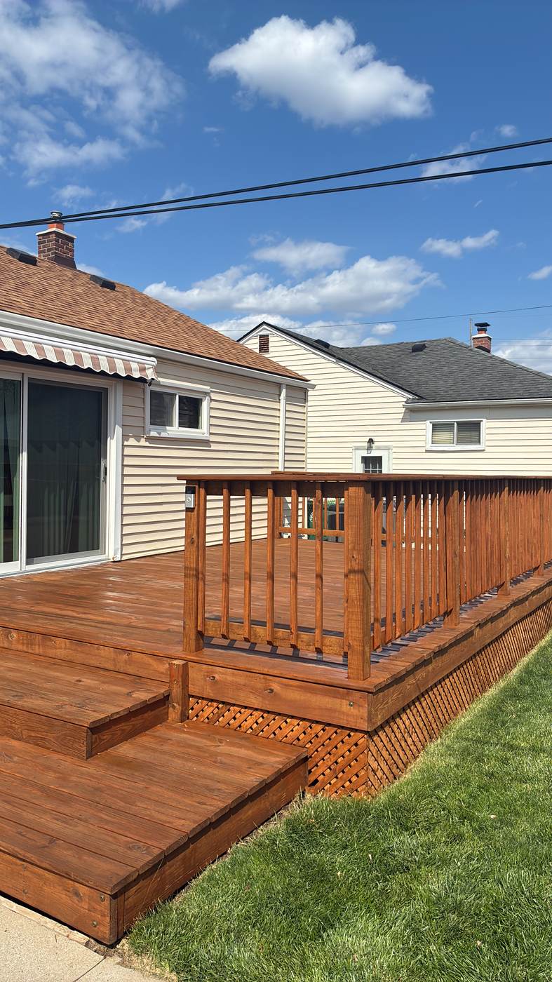 Aerial close-up of a deck railing with a lattice pattern in Brownstown, MI