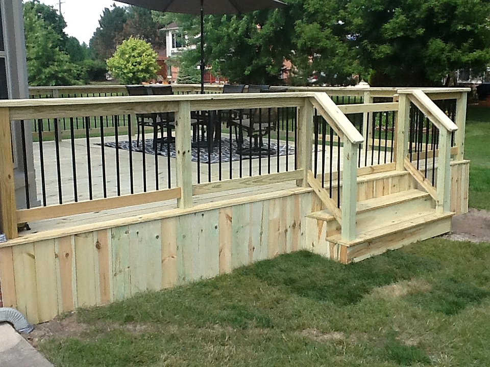 New pressure-treated deck with steps in Chelsea, MI
