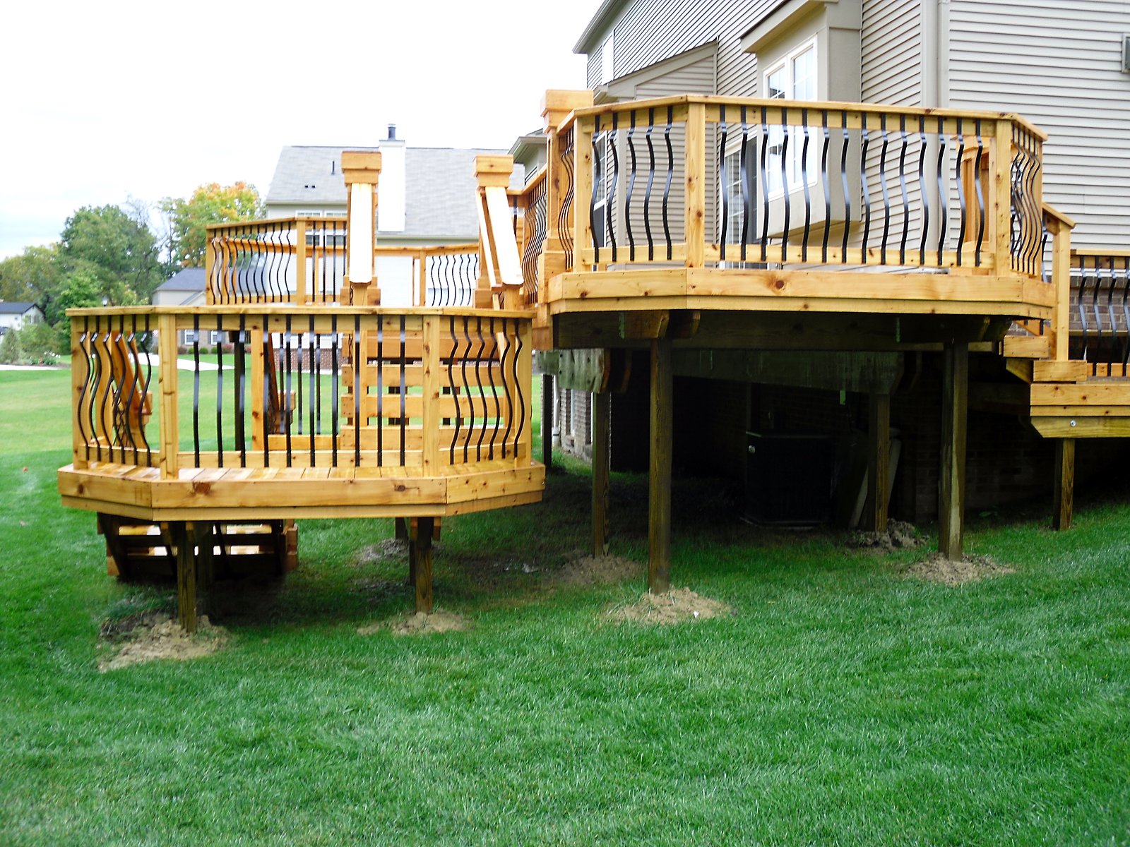 Multi-level deck with wrought iron rail in Fenton, MI