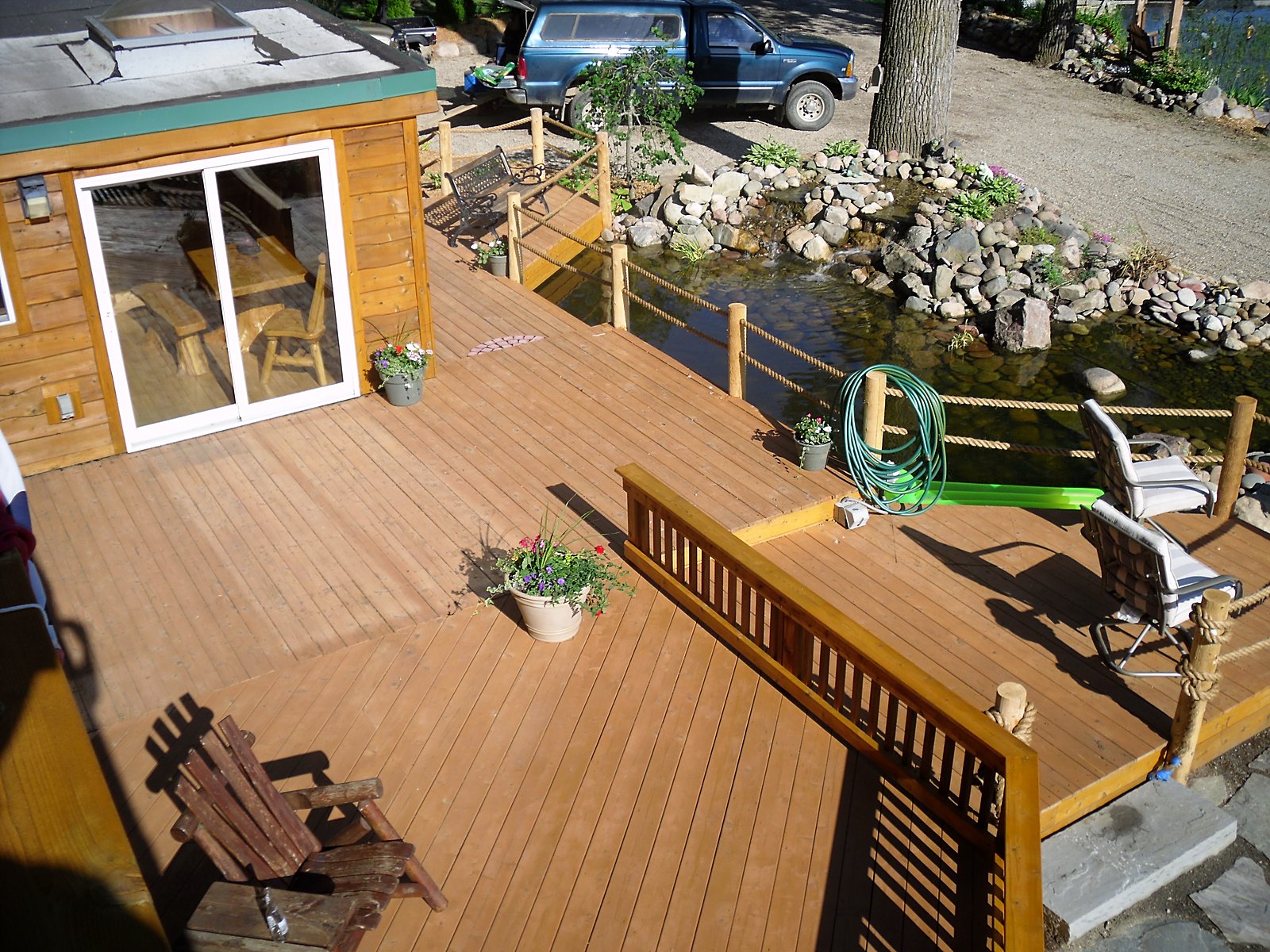 Freshly stained cedar deck in Howell, MI
