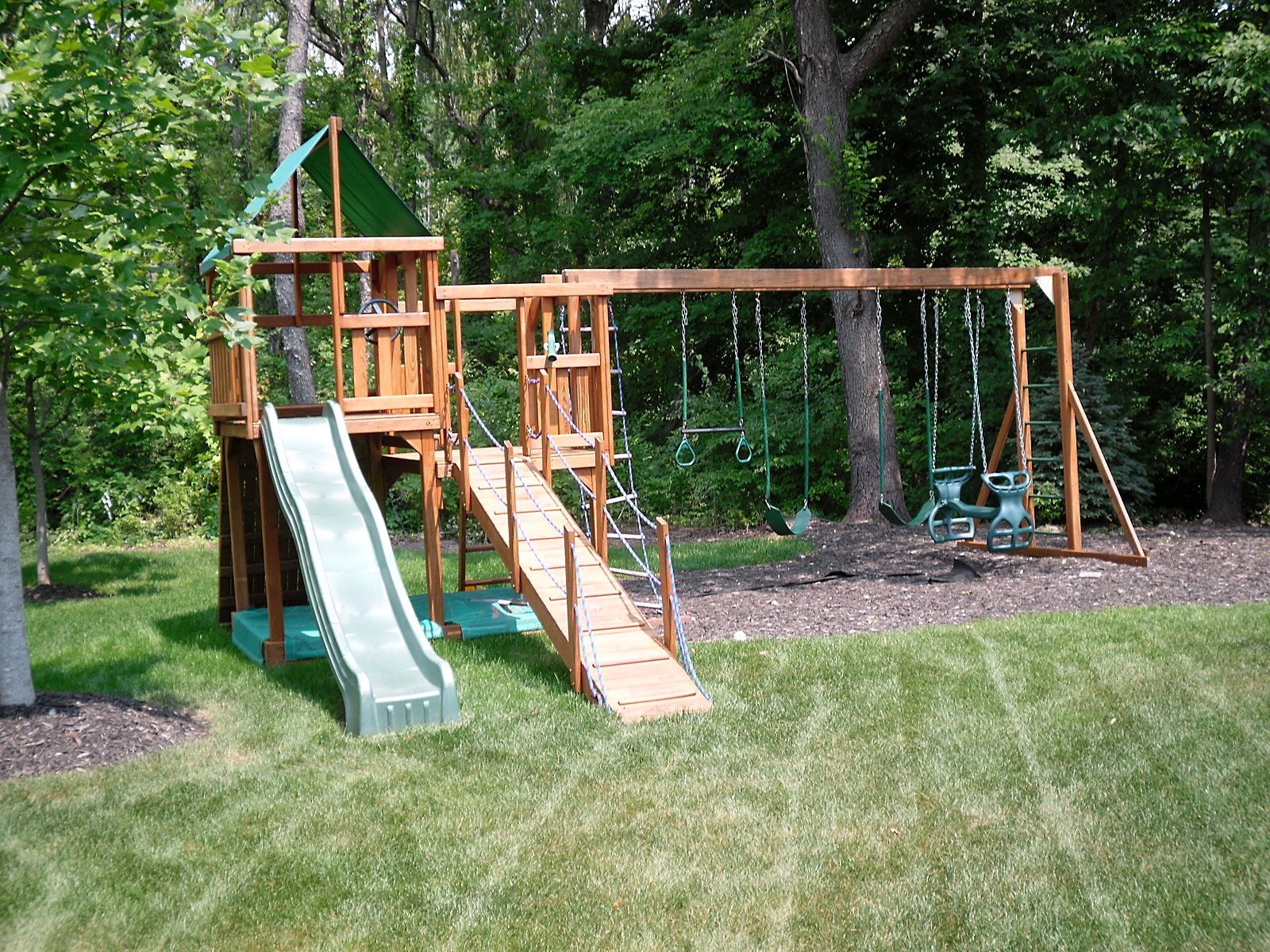 Refinished wooden play set in Novi, MI