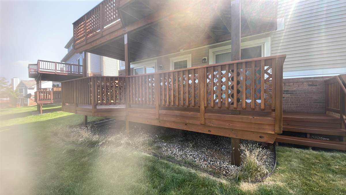 Deck with a lattice-pattern railing design in Orchard Lake, MI