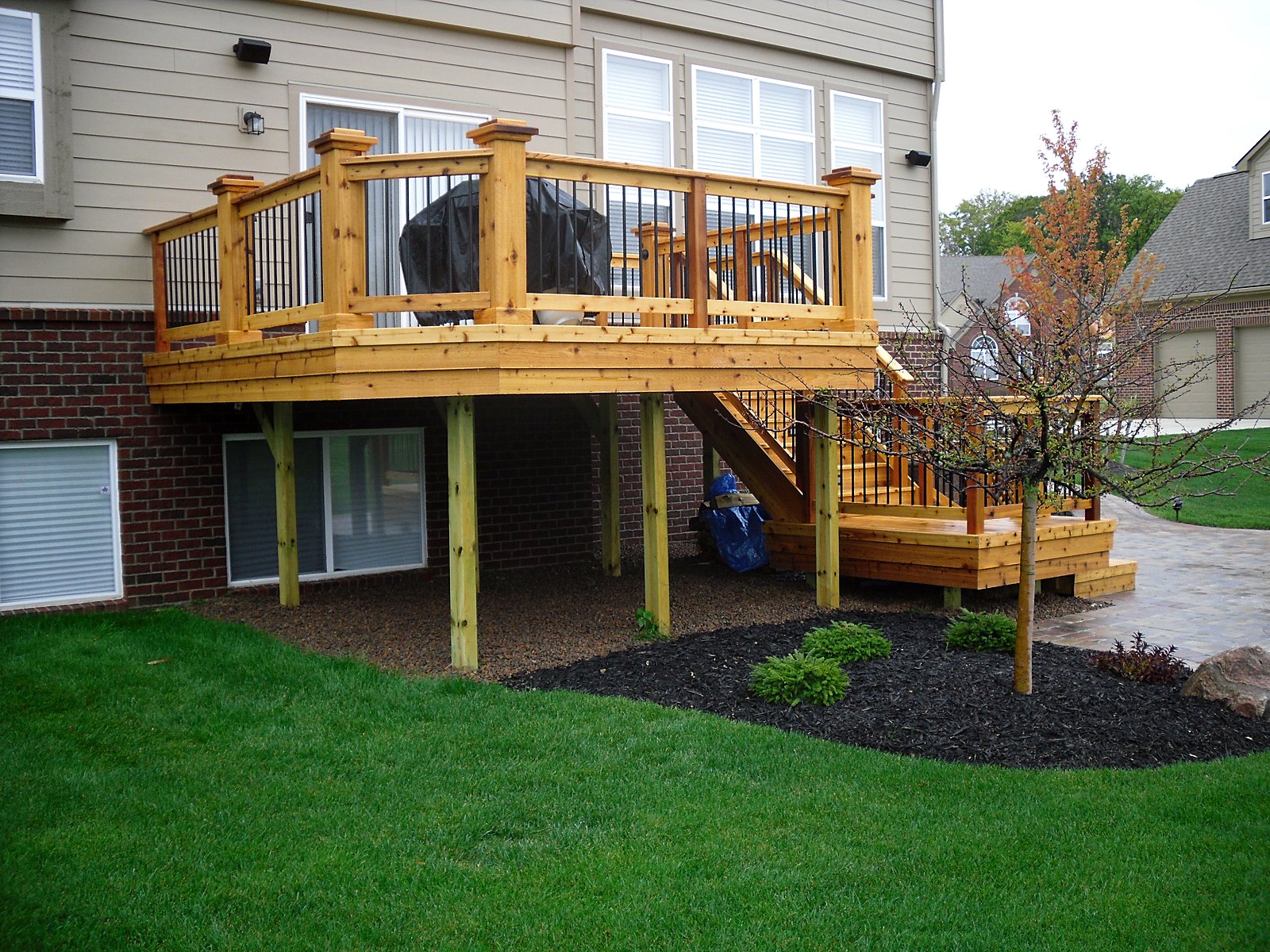 New cedar deck with black rail in Southeast Michigan