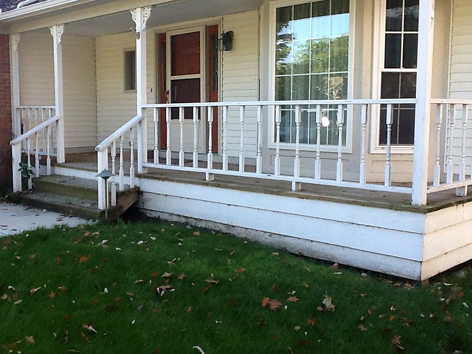 Freshly painted porch railing in Southeast Michigan