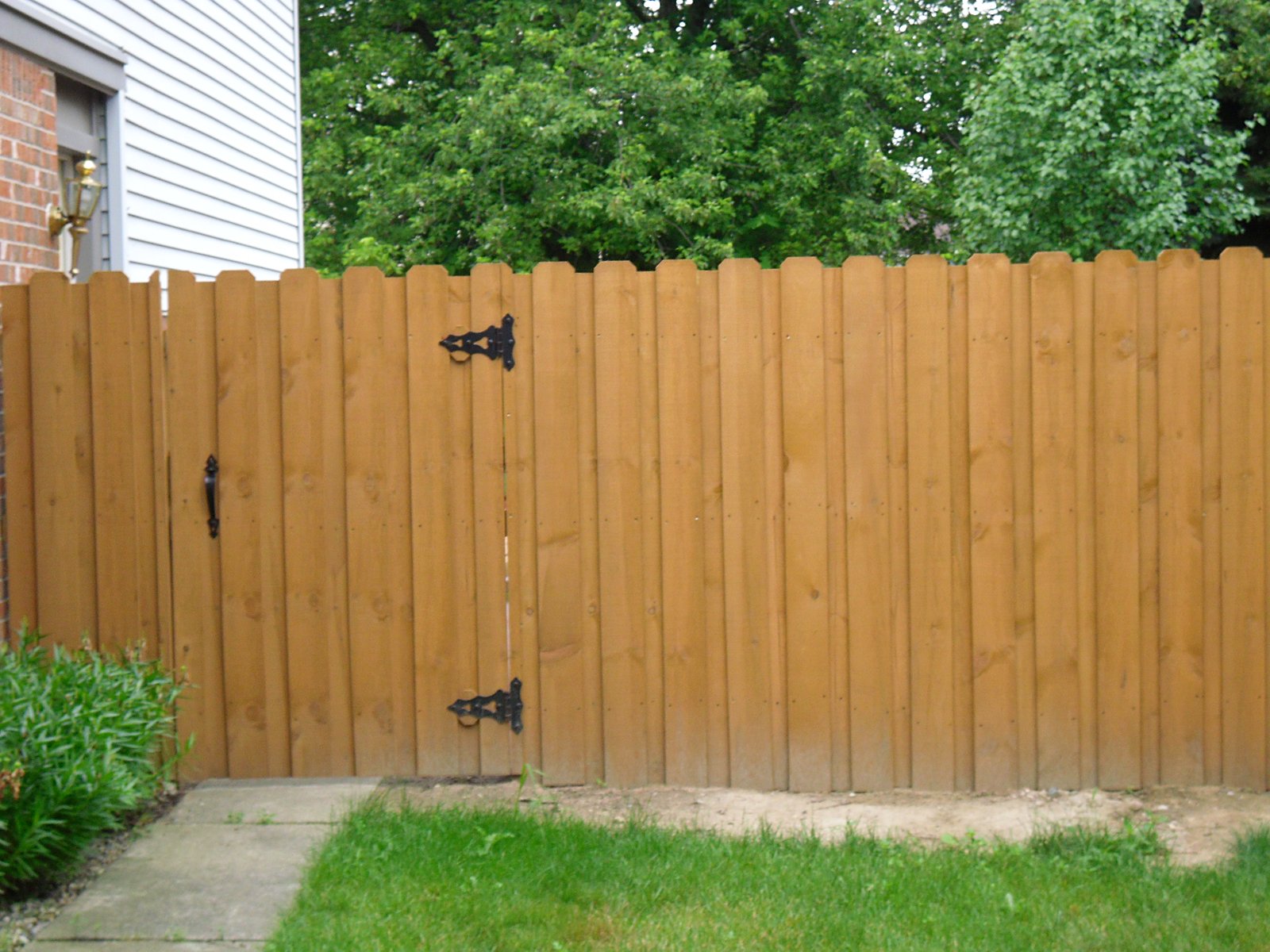 Revived cedar fence with gate in Southeast Michigan