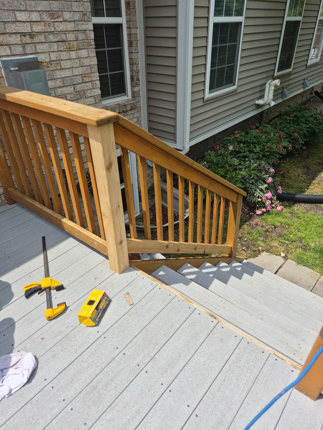 Slat railing installation on a composite deck in Genoa Township, MI