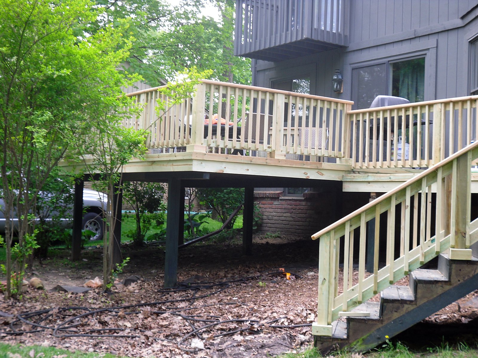 New elevated deck with staircase and railing in Southeast Michigan