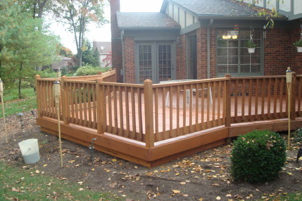 Finished deck hand-brushed with a rich brown stain, Livonia MI